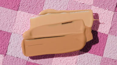 Smeared Foundation Cream on Pink Mosaic Surface