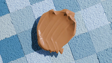 Moving Shadow from Dark Foundation on Blue Mosaic Surface