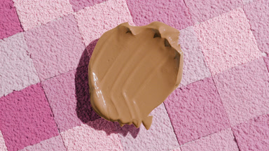 Shifting Shadow from Dark Foundation on Pink Mosaic Surface