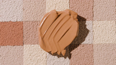 Medium Tone Foundation Shadow on Skin Tone Mosaic Surface