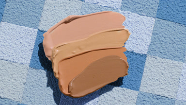 Dynamic Foundation Smears on Blue Mosaic Surface