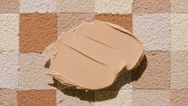 Lively Shadow of Foundation on Beige Mosaic Background