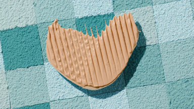 Above View of Heart-Shaped Foundation on Cyan Mosaic