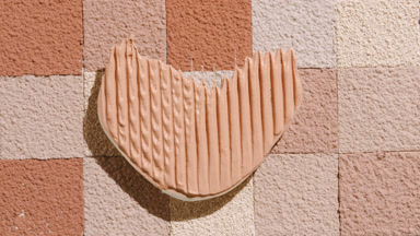 Dynamic Heart-Shaped Foundation on Skin Tone Mosaic