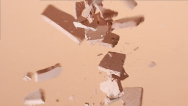 Macro Shot of Beige Powder Collision in Slow Motion