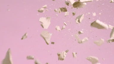 Beige Powder Collision in Slow Motion on Pink Background