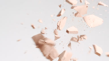 Close-Up of Beige Powder Collision on Neutral Grey Background
