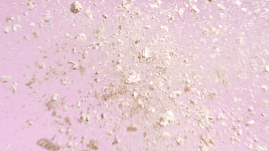 Beige Powders Colliding in High-Detail Slow Motion