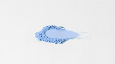 Shifting Shadows on Blue Powder Heap