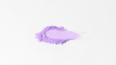 Curved Shot of Violet Powder with Dynamic Lighting