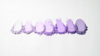 Violet Loose Powder Smears on Gentle Grey Background