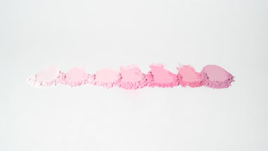 Dynamic Orbiting Light on Pink Powder Smears