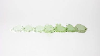 Green Powder Streaks with Rotating Light Effects