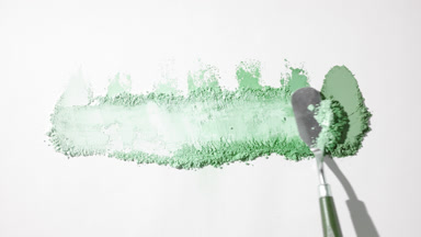 Green Powder Smears on Light Grey Base