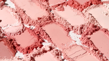 Dynamic Red Powder Smears on Grey Background for Blush Ad