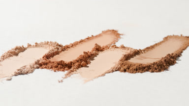 Extreme Close-Up of Beige to Brown Powder Smears