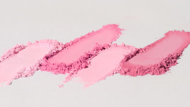 Vertical Close-Up of Pink Powder Smears for Blush Campaign