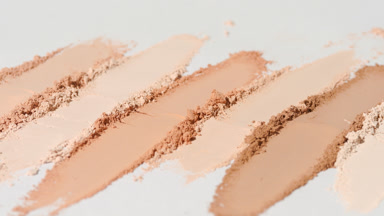 Beige to Brown Powder Arc on Light Grey Background
