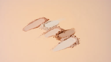 Shifting Shadows on Ordered Beige Powder Smudges