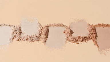 Close-Up of Organized Beige Powder Streaks with Shadows