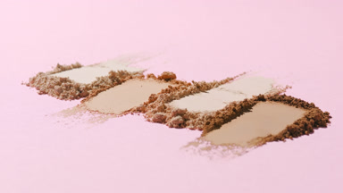 Ultra-Close Shot of Beige to Brown Powder Streaks on Pink