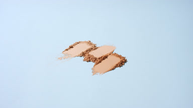 High-Angle View of Lined Beige Powder Smears