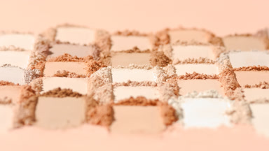 Tracking Shot of Beige and Brown Powder Streaks
