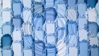 Slow Motion Water Droplet on Blue Powder Smears