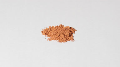 Beige Powder High-Magnification Close-Up on Faint Grey
