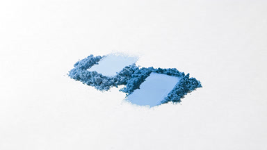Blue Powder Clumps for Eyeshadow Advertising