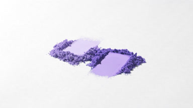Violet Powder Smears on Soft Gray Background