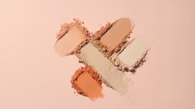Close-Up of Colorful Powder Heaps with Dynamic Lighting