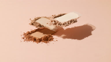 Dynamic Arc Shot of Layered Skin Tone Powder