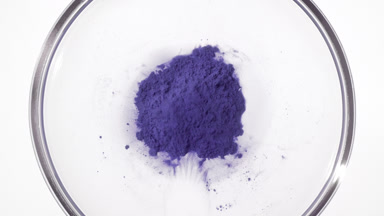Violet Dust Cloud in Petri Dish from Above