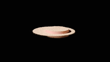 Beige Powder with Strong Shadows on Black Surface