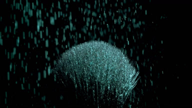 Cyan Powder Close-Up on Black Brush in Slow Motion