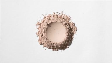 Beige Powder with Spherical Imprint and Shadow Play