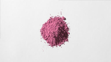 Pink Powder Heap with Evolving Shadows on Light Grey
