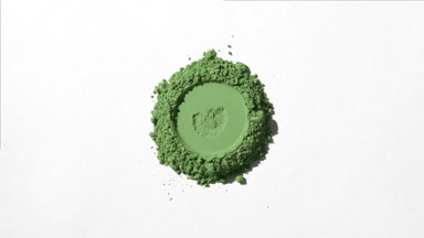 Green Powder Stack with Round Shape on Light Grey