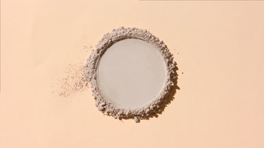 Top Perspective of Beige Powder for Foundation Promotion