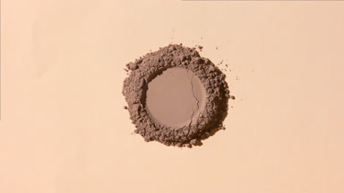Top View of Brown Powder with Circular Trace