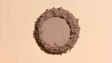 Top Perspective of Brown Powder with Round Shape