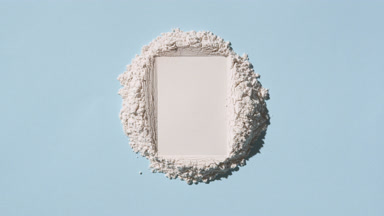 Pale Blue Surface with White Powder and Light Effects