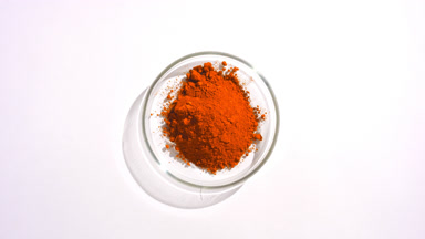 Aerial Shot of Red Powder in Glass Dish
