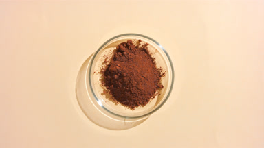 Coffee Powder Displayed in Glass Dish with Shadows