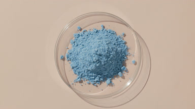 Blue Fine Powder in Petri Dish with Dynamic Lighting