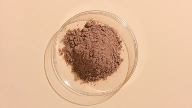 Cocoa Powder in Petri Dish with Dynamic Lighting