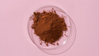 Red Clay Powder in Petri Dish with Dynamic Shadows
