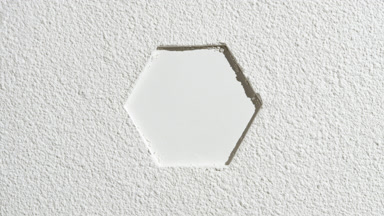 Hexagonal Imprint on Even White Powder Surface