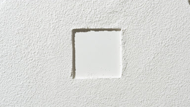 Square Imprint on Flat White Powder Surface